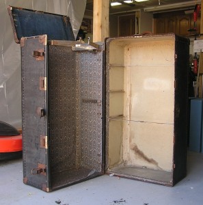 old steamer wardrobe travel trunk missing its inside parts